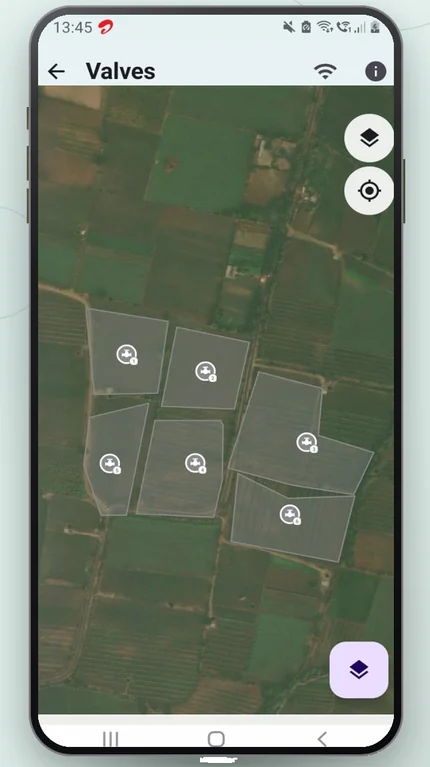 Farm Buddie app satellite map screen showing farm field zones with numbered valve pins
